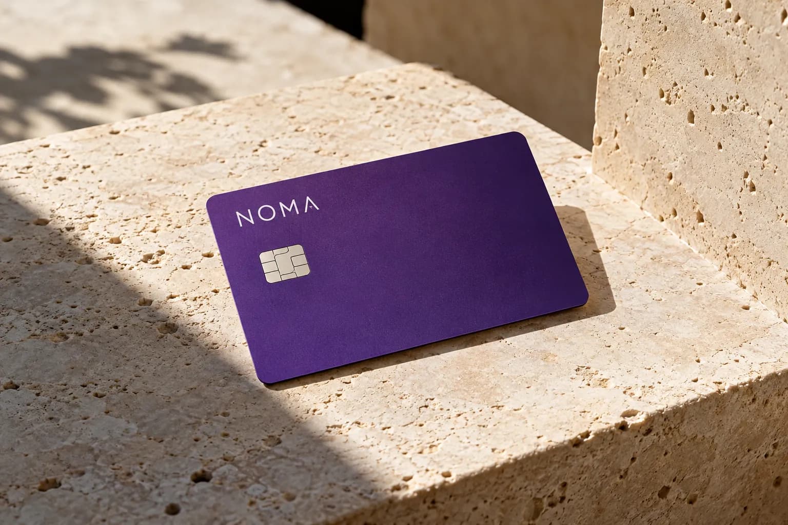 NOMA violet payment card, an illustrative fintech brand